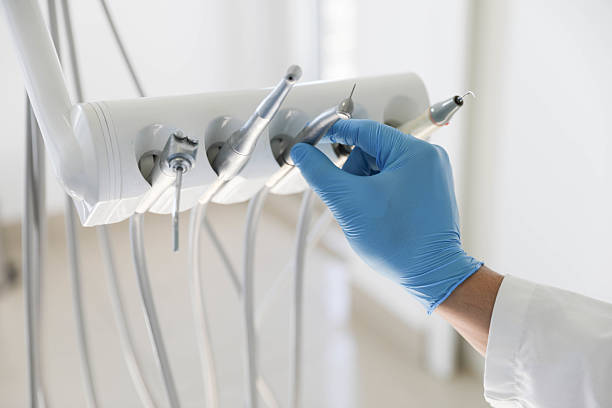 Professional Tooth Extraction technician working in Lloyd Harbor, NY